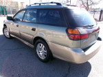 2004 Subaru Outback AWD wagon in silver color, showcasing exterior features and all-wheel drive capability.