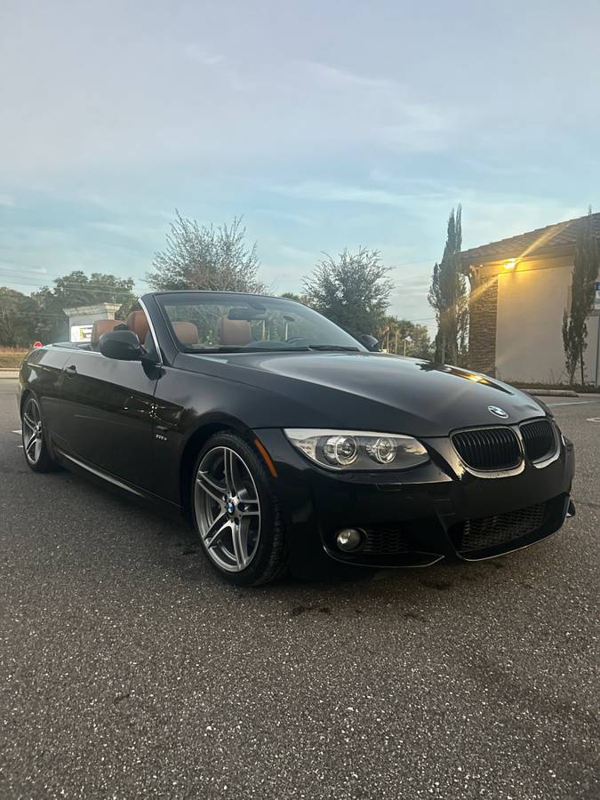 2011 BMW 335IS convertible in excellent condition with brown leather interior and power top
