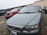 2002 Volvo S60 2.4 sedan parked at repair shop with clean title and good condition for its age