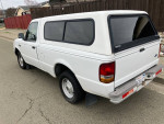 1995 Ford Ranger regular cab white pickup truck parked, featuring clean exterior and good condition.