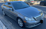 2012 Mercedes-Benz E350 Sport Sedan in Palladium silver, showing clean exterior and alloy wheels