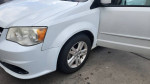 2014 Dodge Grand Caravan with low mileage, clean exterior, suitable for families and cargo transport.