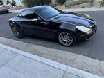 2008 Mercedes-Benz SLK350 convertible in black, showcasing sporty design and clean exterior.