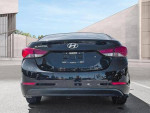 Rear view of a 2013 Hyundai Elantra for sale, low mileage and clean title, perfect for city driving.
