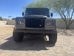 1994 Land Rover Defender 110 with 51.8k miles, showcasing modern upgrades and a clean exterior.