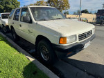 Honda Passport for sale, 79,000 miles, stick shift, reliable vehicle with faded paint, clean interior.