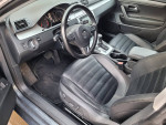 Interior view of a 2009 Volkswagen CC, featuring leather seats and modern controls.