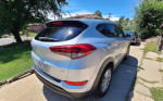 2018 Hyundai Tucson in silver, available for sale, parked on residential street, in excellent condition.