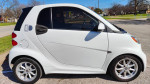 2015 Smart Fortwo Electric Drive Hatchback in white, great for city driving and short commutes.
