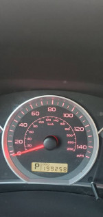 2008 Subaru Impreza dashboard with odometer showing 119,258 miles for sale by owner.