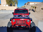 2012 Jeep Wrangler Unlimited Rubicon with lift, USA flag graphics, ready for off-road adventures