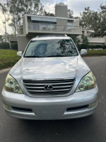 Front view of a silver 2006 Lexus GX 470 4WD, well-maintained with low mileage and family-owned.