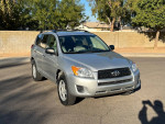 2010 Toyota RAV4 in silver, reliable SUV with 58,000 miles, new front tires and clean title.