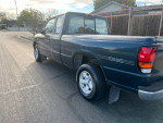 1997 Mazda B4000 pickup truck with SE trim parked on the street, featuring a reliable manual transmission and good condition.
