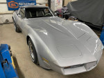 1978 Chevrolet Corvette C3 in mint condition, showcasing sleek silver paint and classic design.