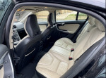 Interior of a 2012 Volvo S60 T5, featuring comfortable leather seats and modern design elements.