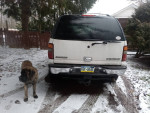 2000 Chevrolet Tahoe in snow, showcasing its rust-free condition and new transmission.