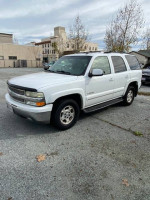 2003 Chevrolet Tahoe LT 4x4 in white, fully loaded with leather seats and new brakes, parked.