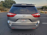 Rear view of a 2020 Toyota Sienna XLE minivan with AWD, showcasing its sleek design and features.
