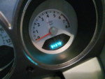 2007 PT Cruiser Convertible dashboard showing 94,379 miles and RPM gauge in low light