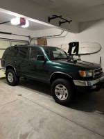 1999 Toyota 4Runner SR5 RWD in Imperial Jade Green, well-maintained with manual transmission and factory features.