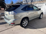 2008 Lexus RX 350 in excellent condition, light tan leather seats, and blue exterior, perfect for winter driving.
