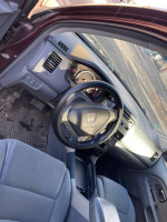 Interior of a 2008 Honda Pilot SUV with low miles and new motor, showcasing dashboard and seating.