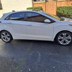 2013 Hyundai Elantra GT for sale in white with custom rims and a sunroof, excellent condition, low mileage.