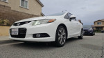 2012 Honda Civic Si Coupe with 82,000 miles, clean exterior and excellent condition parked on the street.