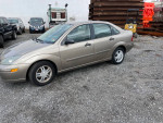2003 Ford Focus with 78,000 miles, excellent condition parked in Staten Island, New York.