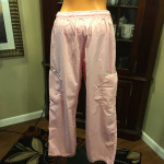Super cute pink scrubs with cute trim on pockets